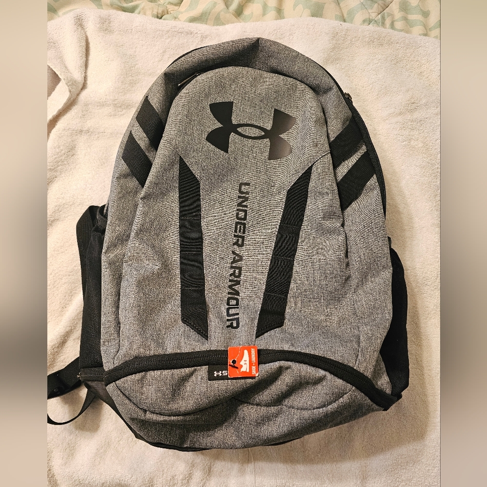 EUC Under Armour Hustle 5.0 Gray and Black Backpack with Padded Straps.